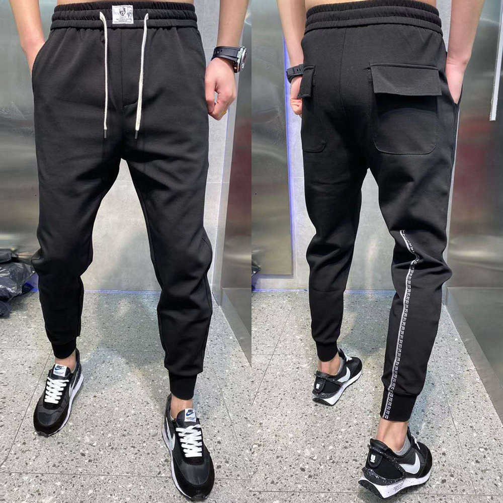 拉风名店2020春季新款白色抽绳运动裤贴标腰边弹力小脚休闲裤男潮