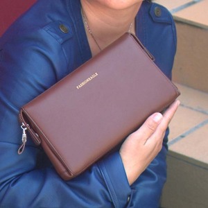 男士手拿包男包休闲商选什么牌子好 同款好推